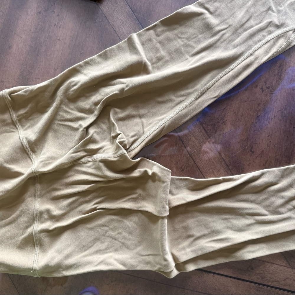 Lulu lemon and Athleta leggings and tank tops sweat shirts sizes 2-4.